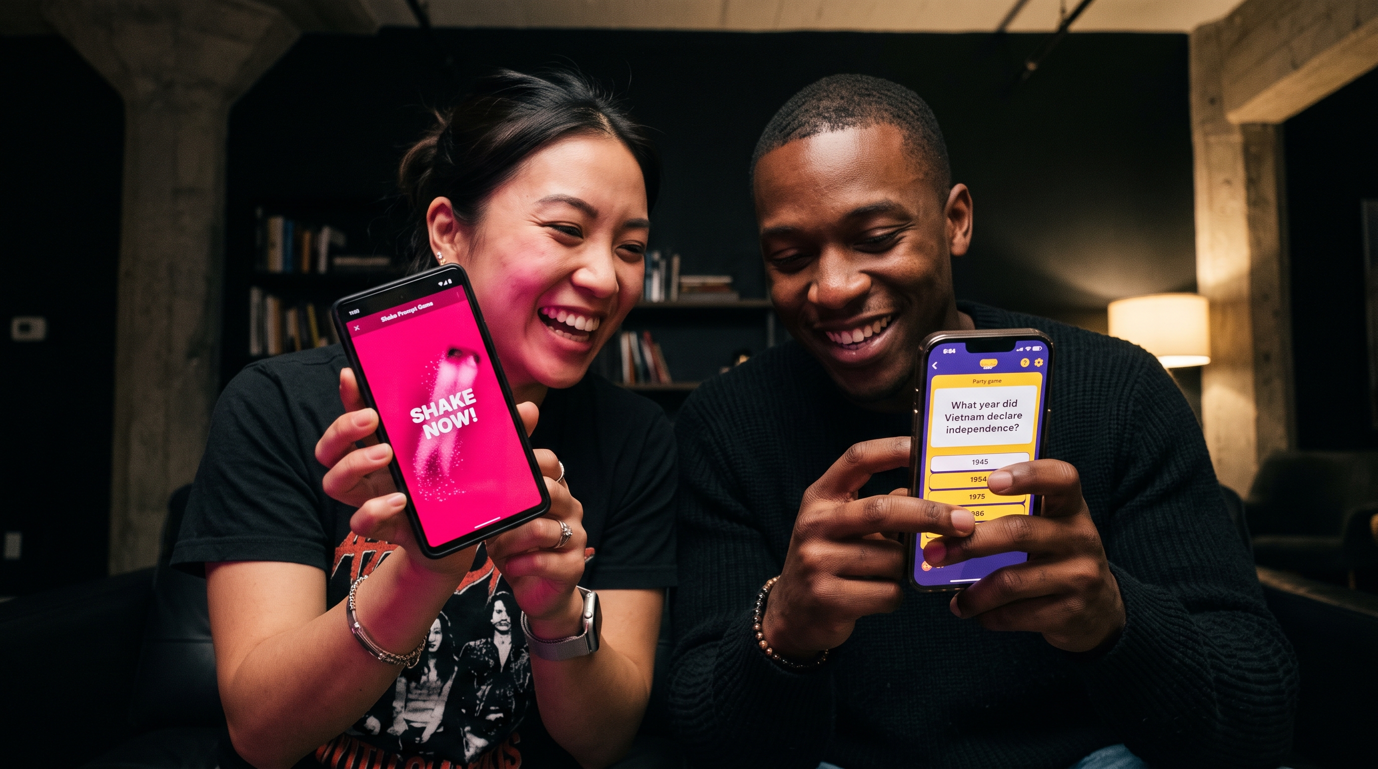 Two phones side by side at a loft party, one running ShakeGasm with hot pink UI, the other running a Jackbox-style trivia screen